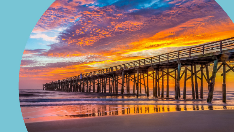 A beautiful view of Flagler Beach Fishing Pier at sunrise in Florida.