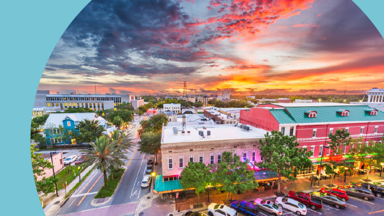 The downtown cityscape at dusk in Gainesville, one of the best places to retire in the Florida Panhandle.