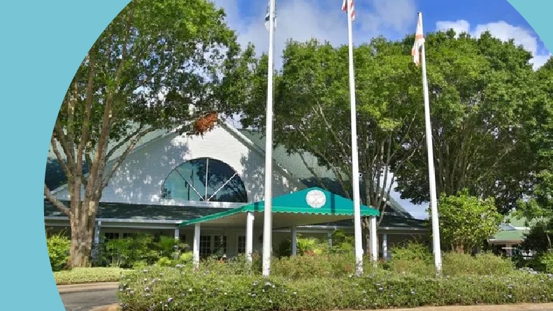 Trees surrounding the entrance to the clubhouse at Halifax Plantation in Ormond Beach, Florida.
