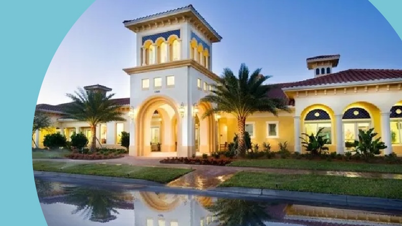Palm trees beside the entrance to IslandWalk at West Villages in Wellen Park, Florida.