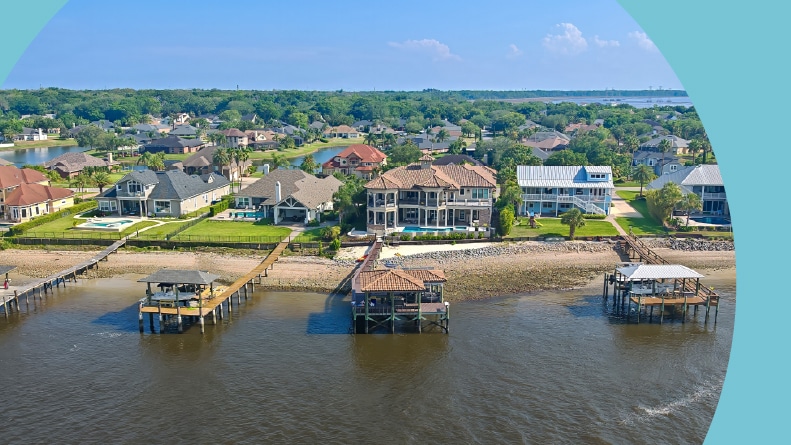 Aerial view of modern villas in the river before entering Jacksonville harbour.