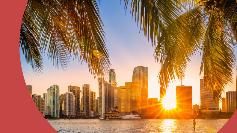 Sunbeams shining through the skyscrapers in Miami, Florida.
