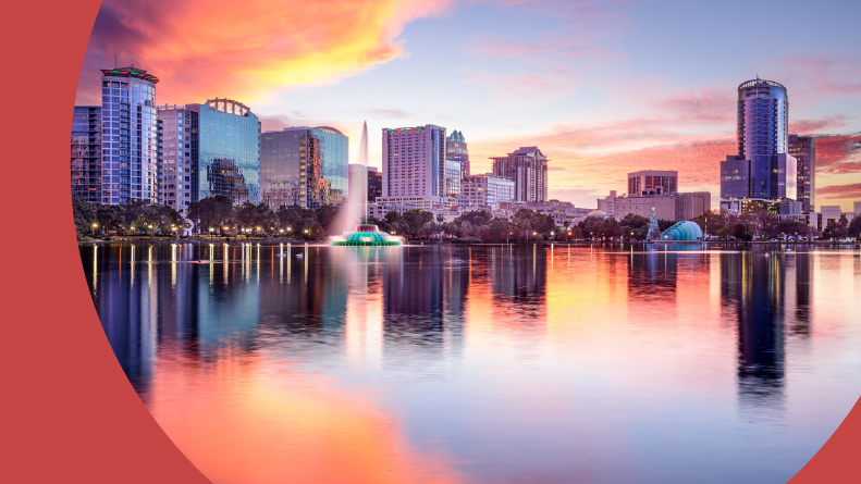 The downtown city skyline viewed from Eola Park in Orlando, Florida.