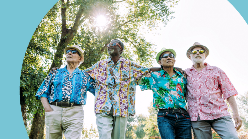A group of senior male friends enjoying the park.