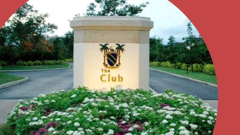 The entrance to the community clubhouse at Pelican Bay in Naples, Florida.