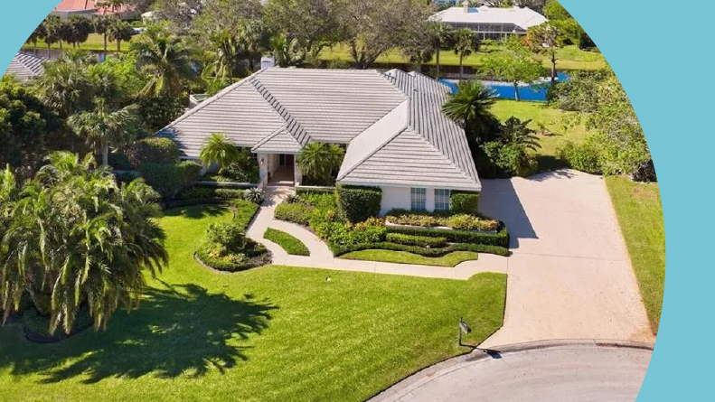Aerial view of a home in Pelican Bay in Naples, Florida.