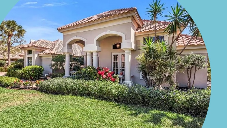 Exterior view of a home at Pelican Landing in Bonita Springs, Florida.