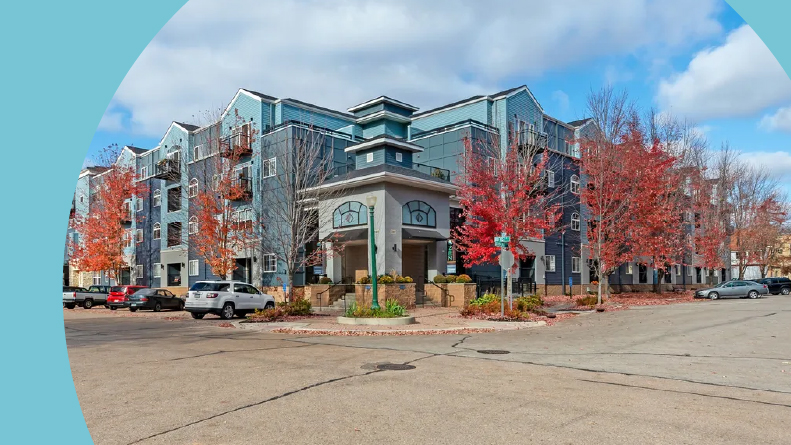 Exterior view of the apartment building at Zen Chaska in Chaska, Minnesota.