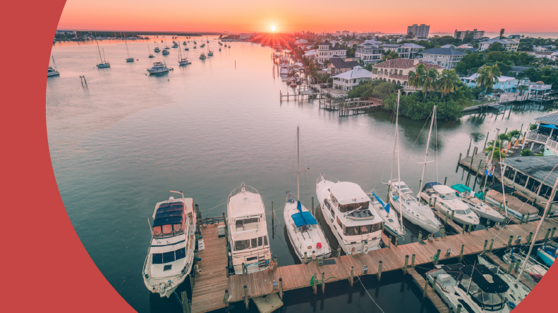 Aerial view of boats along a dock in Fort Myers Beach, Florida.
