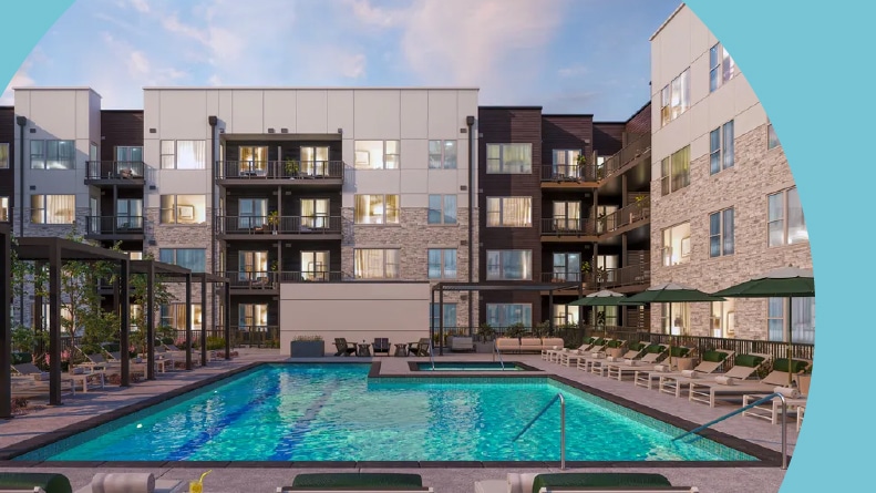 Lounge chairs beside the outdoor pool at Aspendale Northglenn in Northglenn, Colorado.
