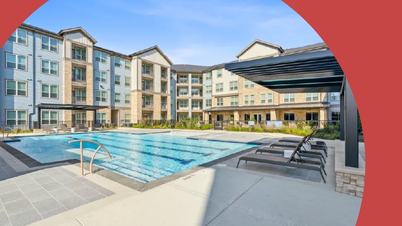 Lounge chairs beside the outdoor pool at Casella in Spring, Texas.