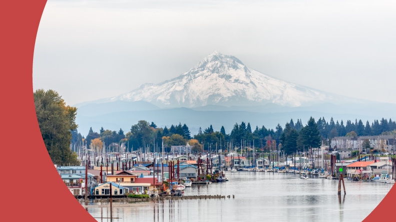 View of Mt. Hood, Portland Marina, and floating boat houses in Oregon.