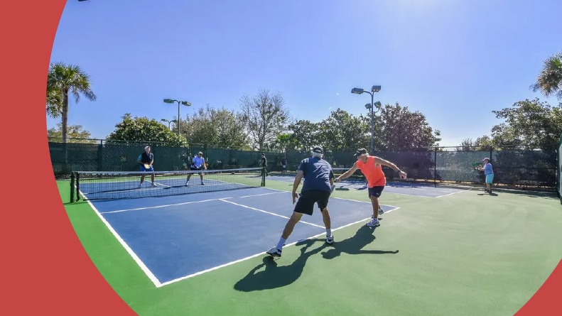 A group of 55+ residents playing pickleball at The Villages of Citrus Hills in Hernando, Florida.