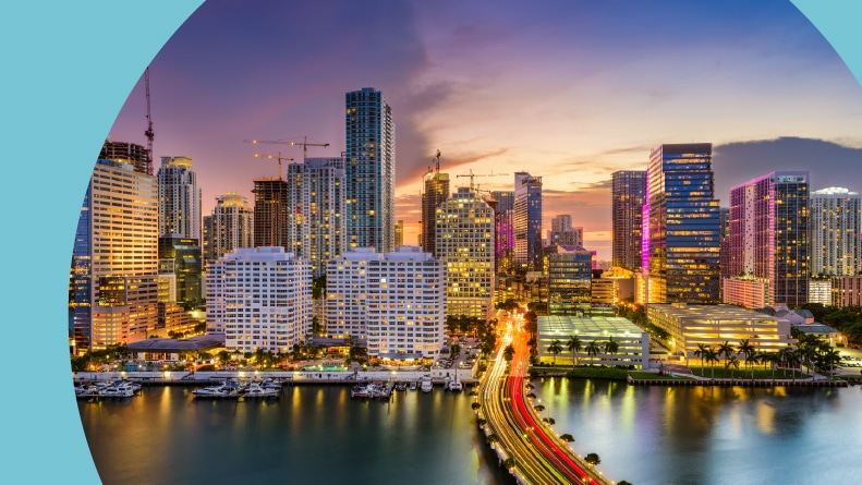 The Miami, Florida skyline and Biscayne Bay at night.