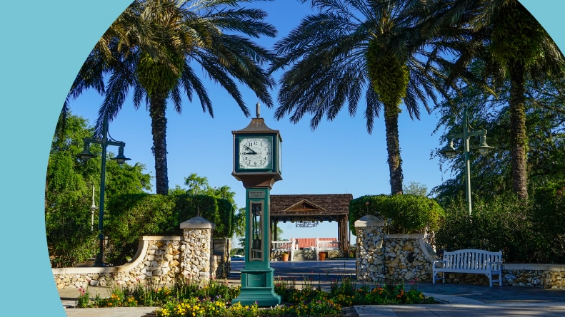 Palm trees surrounding a plaza area in The Villages of Florida.