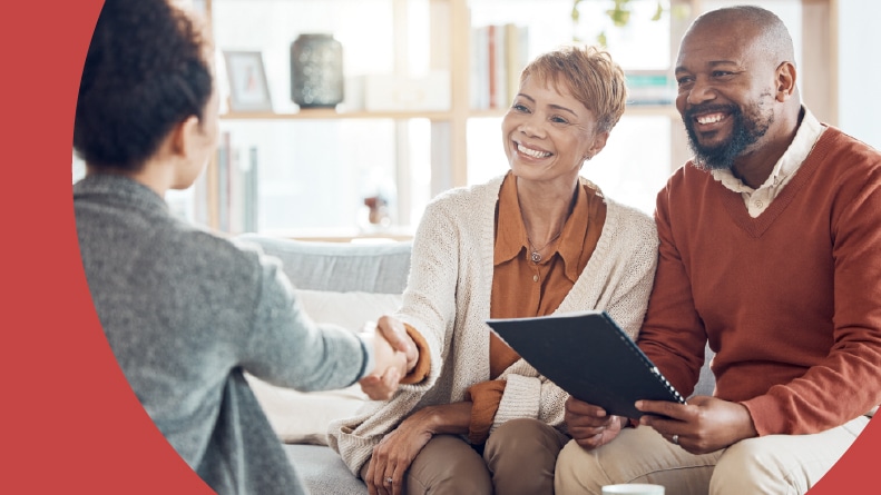 A 55+ couple meeting with their 55places partner agent.