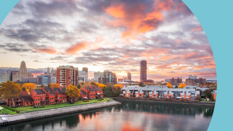 The downtown city skyline on Lake Erie at dawn in Buffalo, New York.