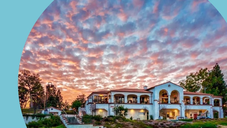 A colorful sunset over the clubhouse at Laguna Woods Village in Laguna Woods, California.