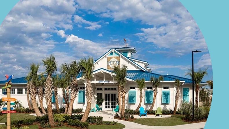 Palm trees outside the clubhouse at Latitude Margaritaville Watersound in Panama City Beach, Florida.