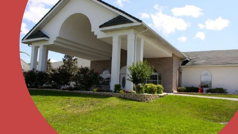 Exterior view of the clubhouse at Ocala Palms in Ocala, Florida.