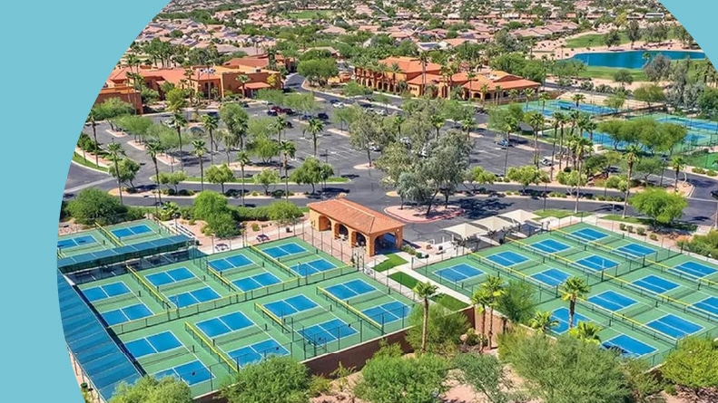 Aerial view of the sports courts at PebbleCreek in Goodyear, Arizona.