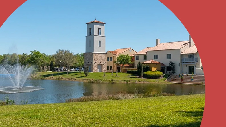A pond beside community buildings on the grounds of Solivita in Kissimmee, Florida.