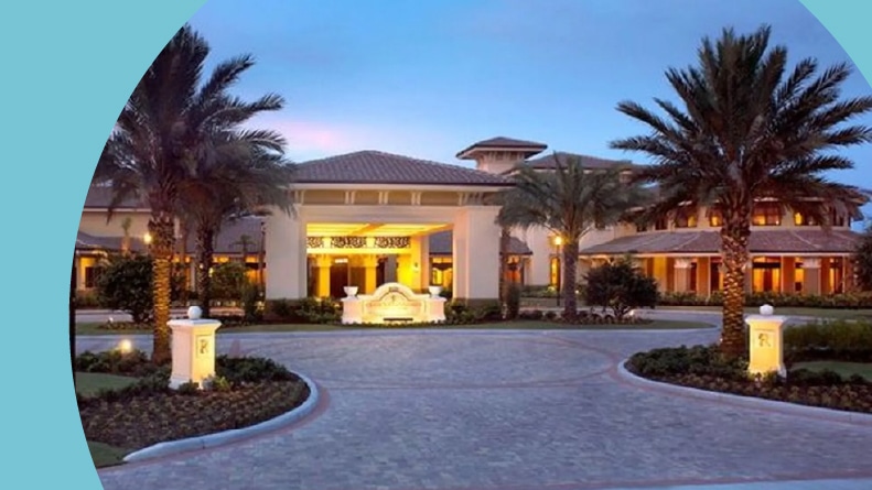Palm trees outside the clubhouse at Sun City Center in Sun City Center, Florida.
