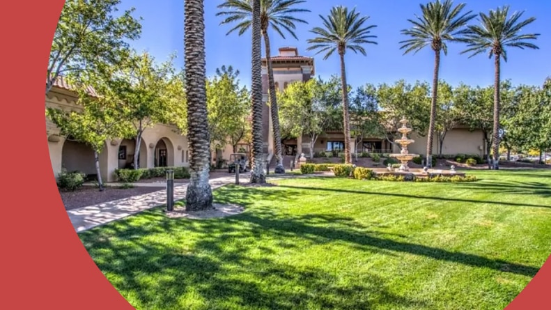 Palm trees on the well-landscaped grounds of Sun City Summerlin in Las Vegas, Nevada.