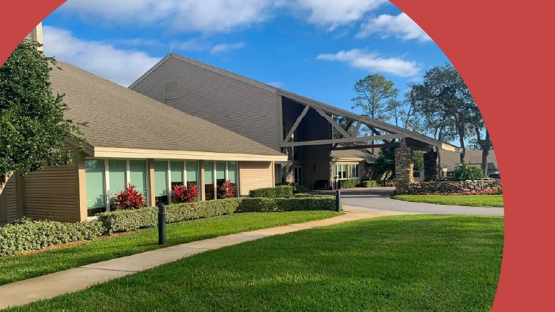 Exterior view of a community building at Timber Pines in Spring Hill, Florida.