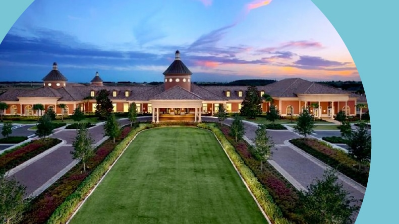 Aerial view of the clubhouse and entrance to Trilogy Orlando in Groveland, Florida.