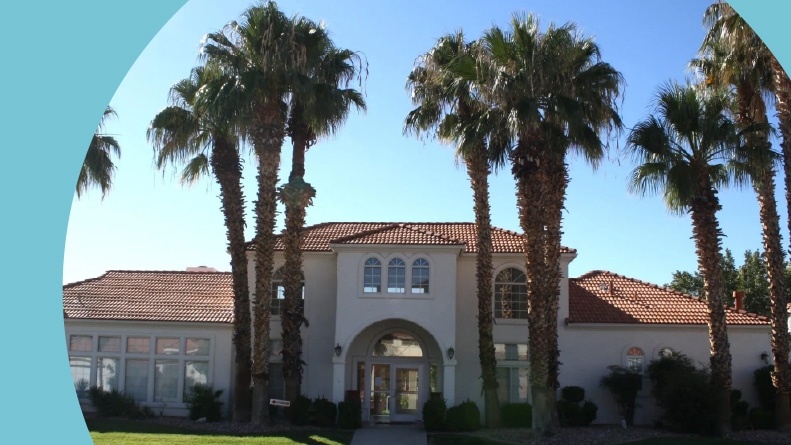 Palm trees beside a community building at Vista del Sol in St. George, Utah.