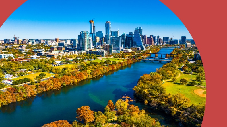 Aerial view of Austin, Texas and the Colorado River on a sunny day.