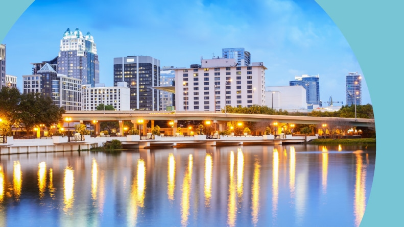 The downtown skyline and Lake Eola Park in Orlando Florida.