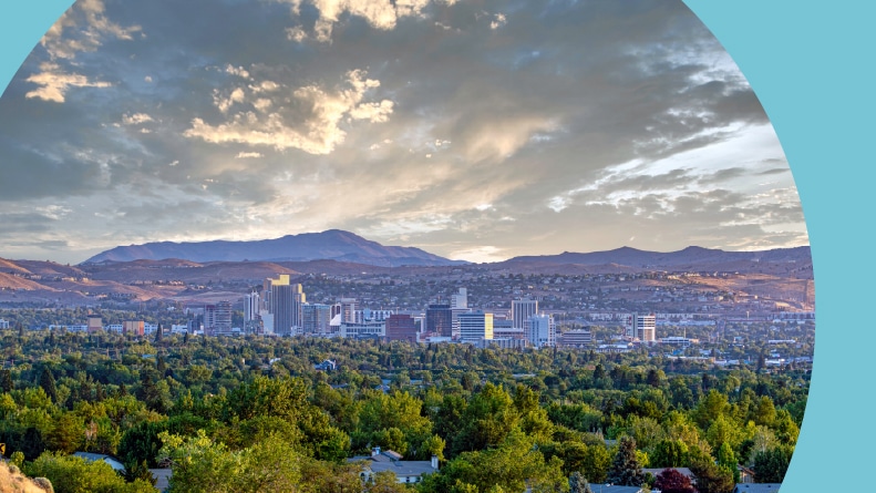The cityscape of Reno, Nevada with a dramatic sky.