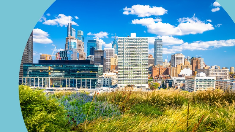 View of the Philadelphia skyline from Cira Green Park on a sunny day.