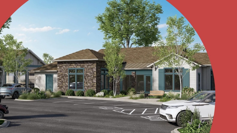 Rendering of cars parked in front of a community building at Silverado Village in Sparks, Nevada.