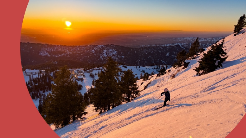 Downhill skiing at sundown at Bogus Basin ski resort in Boise, Idaho, one of the best places to live for skiing.