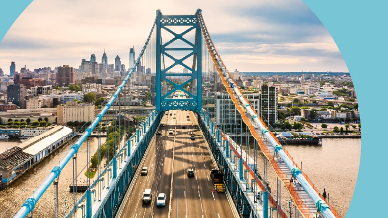 Aerial view of the Ben Franklin Bridge and the Philadelphia skyline.