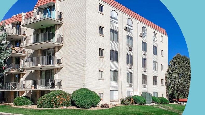 Exterior view of the condo building in Valencia Condominiums in Wheat Ridge, Colorado.