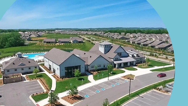 Aerial view of the clubhouse, amenities, and homes at Del Webb Southern Springs in Spring Hill, Tennessee.
