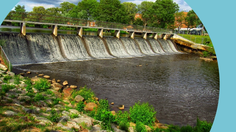 Water flowing over a dam at Silver Lake in Dover, Delaware.