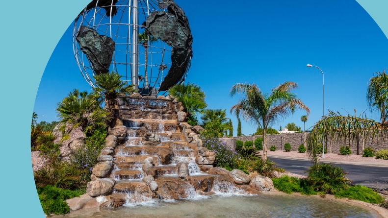 A globe on top of a water feature at Leisure World in Mesa, Arizona.