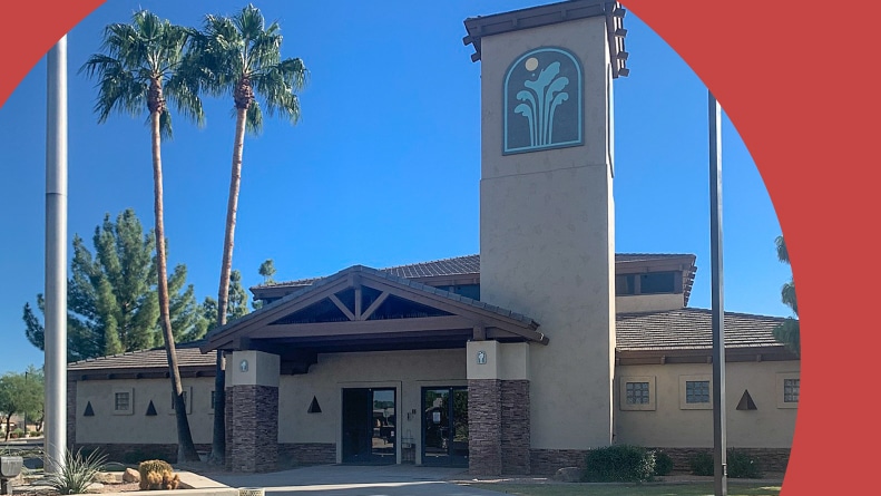 Exterior view of the clubhouse at Sunland Springs Village in Mesa, Arizona.