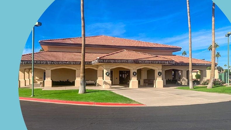 Exterior view of the clubhouse at Sunland Village East in Mesa, Arizona.