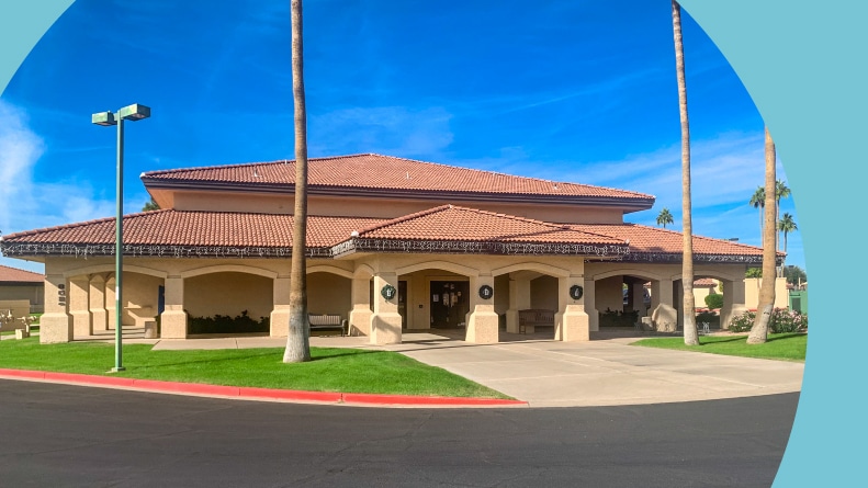 Exterior view of the clubhouse at Sunland Village East in Mesa, Arizona.