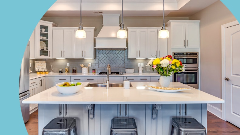 Interior view of the kitchen in a model home at The Courtyards at Tega Cay in Tega Cay, South Carolina.