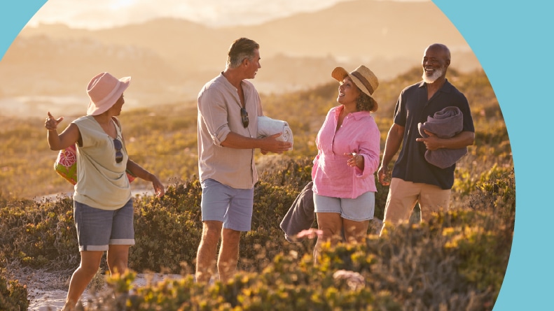 A group of 55+ friends enjoying a day at the beach.
