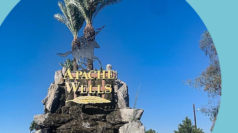 The decorative community sign at Apache Wells in Mesa, Arizona.