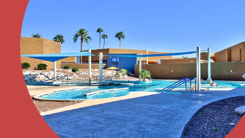 The outdoor pool at Four Seasons at the Manor in Sun City, Arizona.