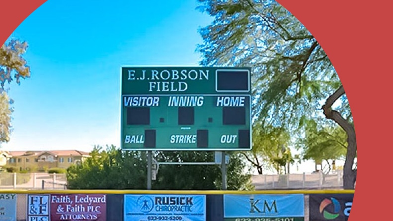 The scoreboard on the softball field at PebbleCreek in Goodyear, Arizona.
